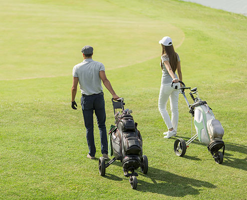 Couple Golfer Golf Bags